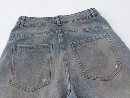Distressed baggy denim jeans with wide leg cut