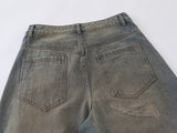 Wide-leg distressed denim jeans