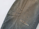 Wide-leg distressed denim jeans