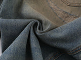 Wide-leg distressed denim jeans
