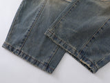 Wide-leg distressed denim jeans