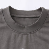 DAXUEN Distressed graphic T-shirt with human silhouette
