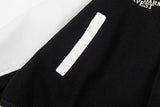 DAXUEN Varsity bomber jacket with contrasting colors and graphics