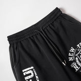 DAXUEN Graphic print wide leg sweatpants in black and white