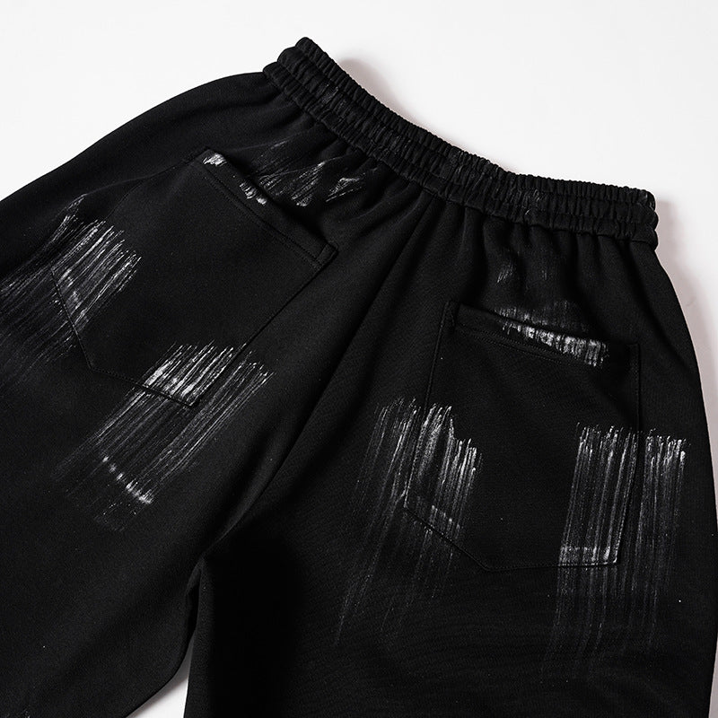 DAXUEN Distressed graffiti wide-leg sweatpants
