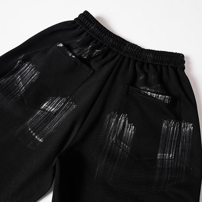 DAXUEN Distressed graffiti wide-leg sweatpants