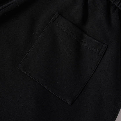 DAXUEN Graphic print wide leg sweatpants in black and white