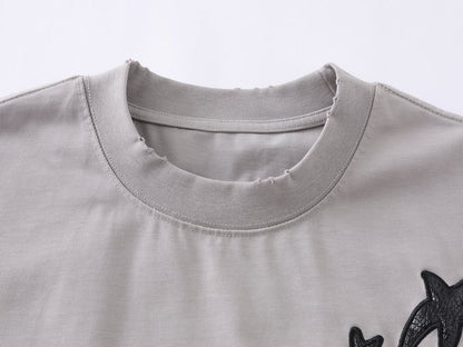 DAXUEN Distressed oversized t-shirt with star graphics