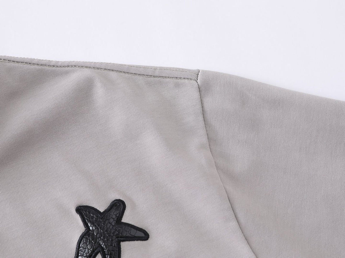 DAXUEN Distressed oversized t-shirt with star graphics