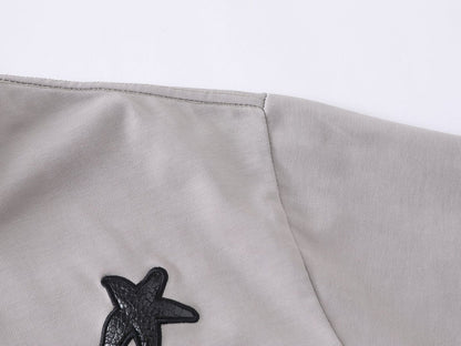 DAXUEN Distressed oversized t-shirt with star graphics