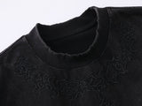 DAXUEN Oversized short-sleeved t-shirt with cross embroidery