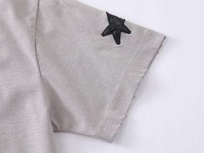 DAXUEN Distressed oversized t-shirt with star graphics