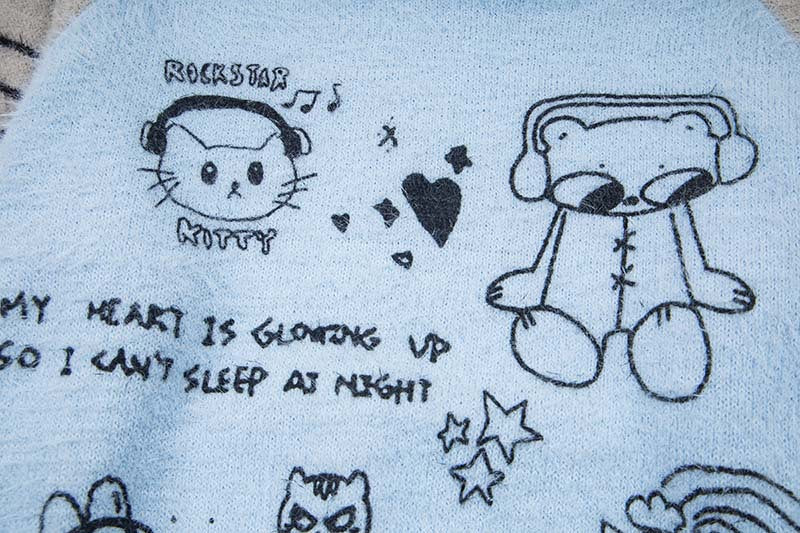 DAXUEN Hooded sweater with cartoon graphics and contrasting sleeves