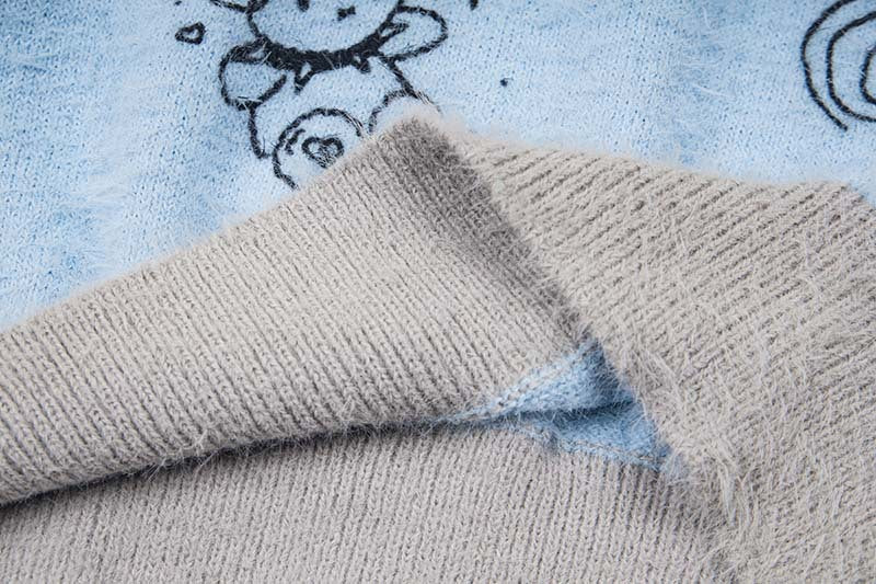 DAXUEN Hooded sweater with cartoon graphics and contrasting sleeves