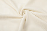 DAXUEN Asymmetrical collar short-sleeve top in cream and black