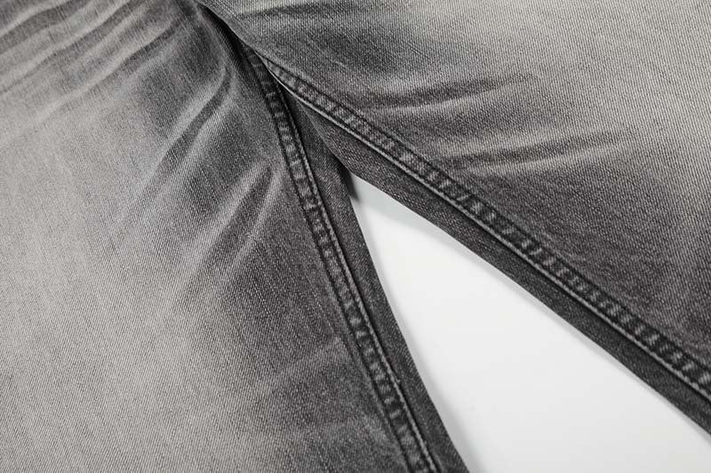 DAXUEN Distressed high-waisted wide-leg jeans in washed black denim