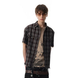 DAXUEN Distressed plaid button-up shirt with frayed edges