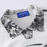 DAXUEN Casual short-sleeve collared top with animal print