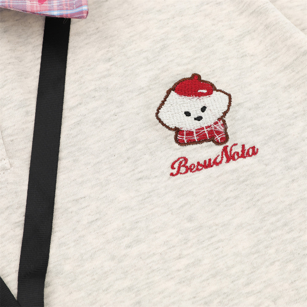 DAXUEN Layered polo shirt with cartoon graphics and plaid accents