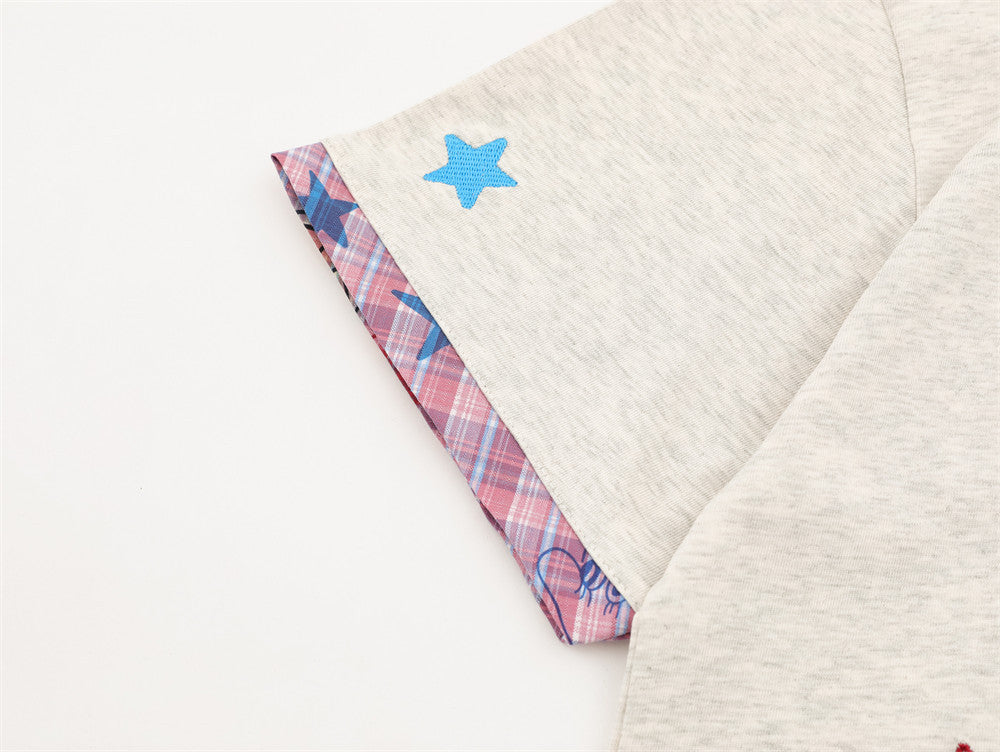 DAXUEN Layered polo shirt with cartoon graphics and plaid accents