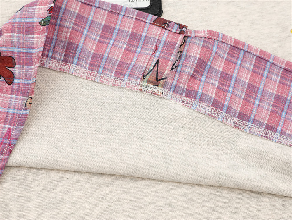 DAXUEN Layered polo shirt with cartoon graphics and plaid accents
