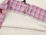 DAXUEN Layered polo shirt with cartoon graphics and plaid accents