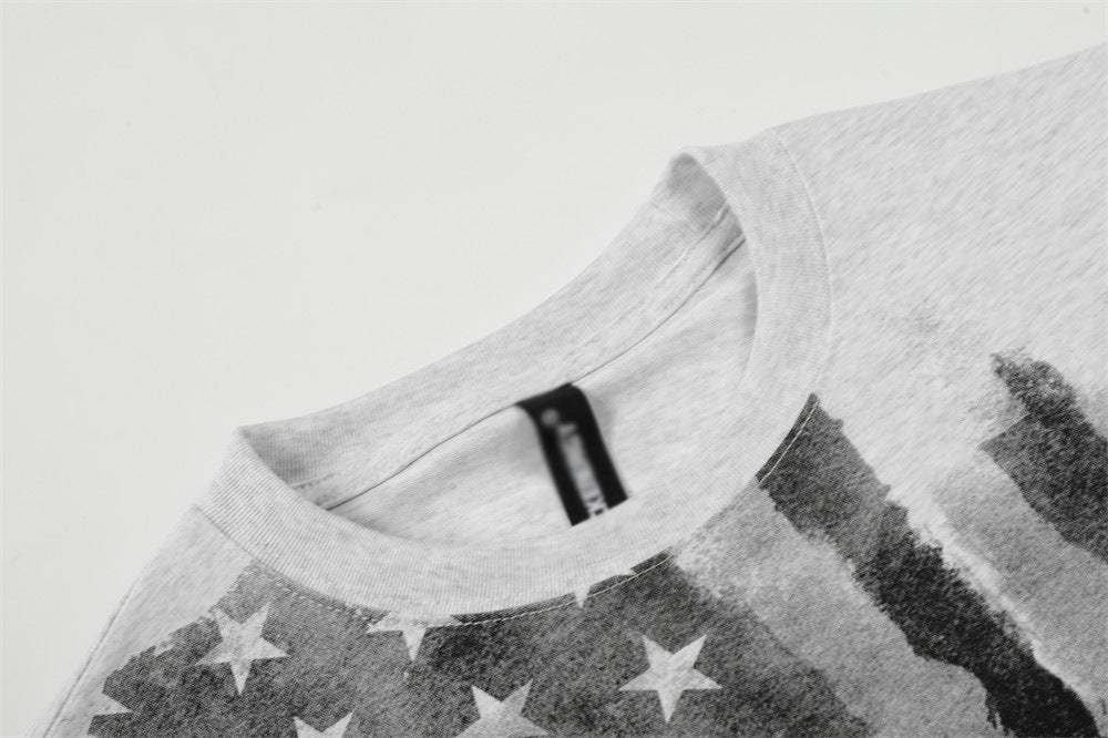 DAXUEN Short-sleeved graphic T-shirt with distressed flag design