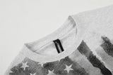 DAXUEN Short-sleeved graphic T-shirt with distressed flag design