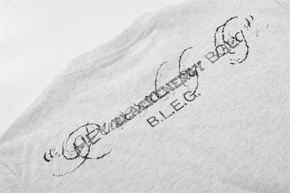 DAXUEN Short-sleeved graphic T-shirt with distressed flag design