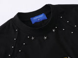 DAXUEN Bold oversized t-shirt with graphic embroidery and studs