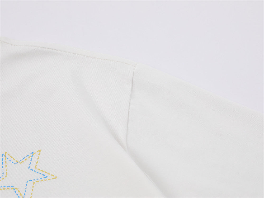DAXUEN Playful apple graphic T-shirt with bear design