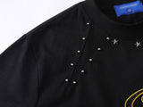 DAXUEN Bold oversized t-shirt with graphic embroidery and studs