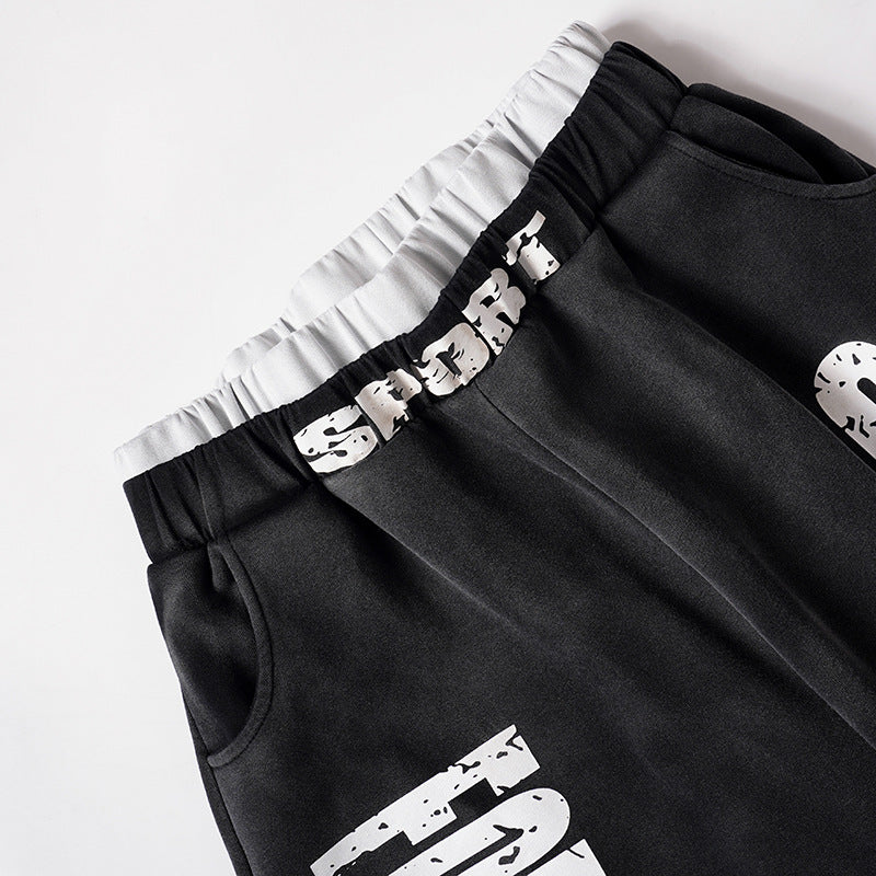 DAXUEN Distressed wide-leg sweatpants in black and grey