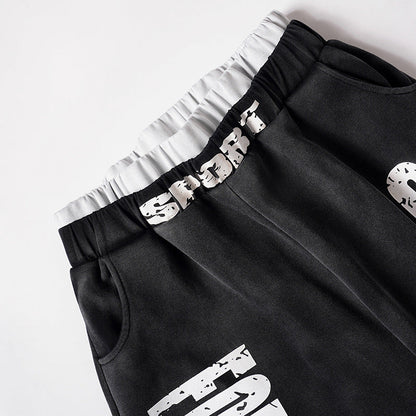DAXUEN Distressed wide-leg sweatpants in black and grey