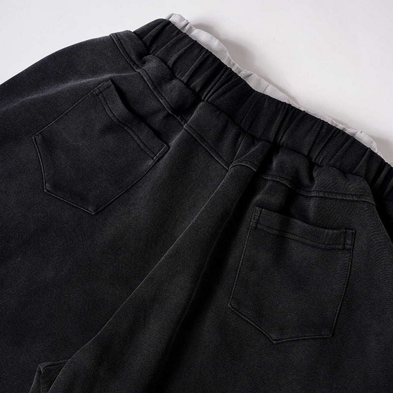 DAXUEN Distressed wide-leg sweatpants in black and grey