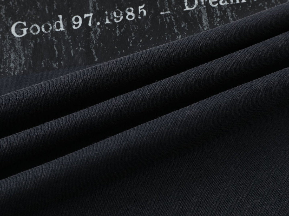 DAXUEN Distressed graphic t-shirt with raw edges
