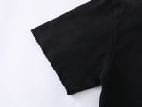 DAXUEN Distressed oversized crew-neck t-shirt with graphic prints
