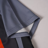 DAXUEN Multi-panel short-sleeved t-shirt in grey, black, and orange
