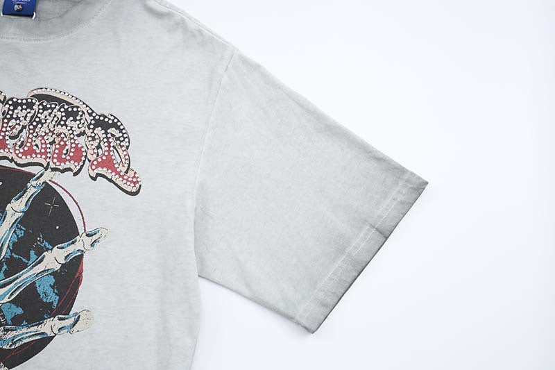 DAXUEN Oversized t-shirt with skull graphic and distressed text