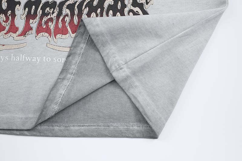 DAXUEN Oversized t-shirt with skull graphic and distressed text