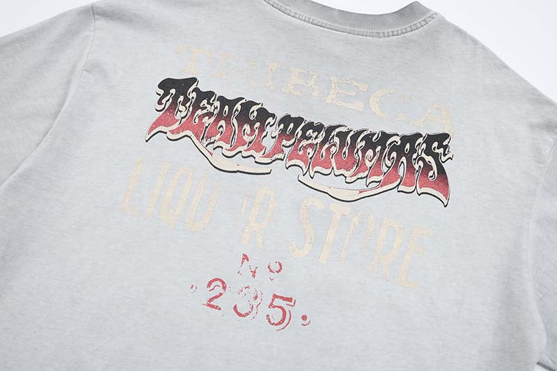 DAXUEN Oversized t-shirt with skull graphic and distressed text