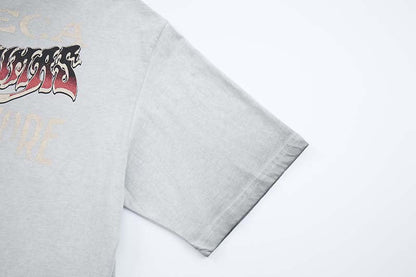 DAXUEN Oversized t-shirt with skull graphic and distressed text