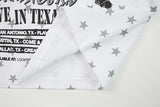 DAXUEN Layered top featuring graphic print vest over t-shirt