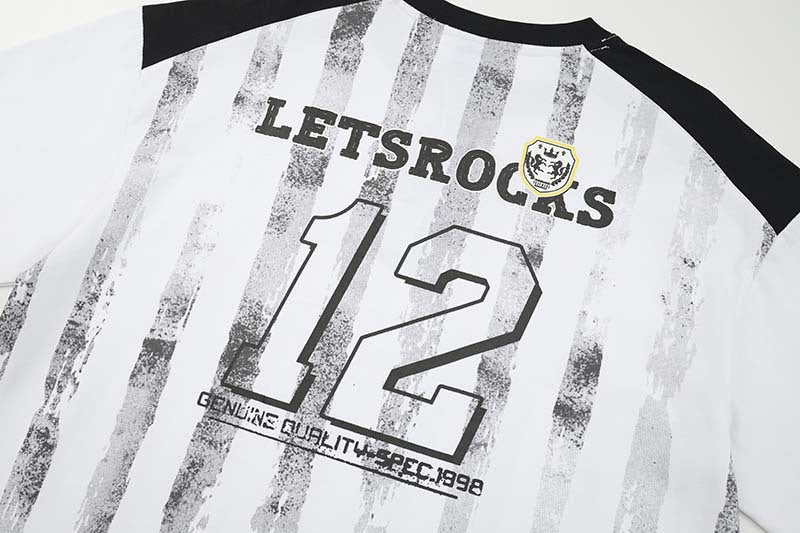DAXUEN Raglan short-sleeved T-shirt with vertical stripes and graphics