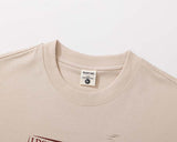 DAXUEN Relaxed-fit crew neck T-shirt with distressed graphic print