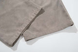 DAXUEN Distressed wide-leg trousers in taupe with paint splatters