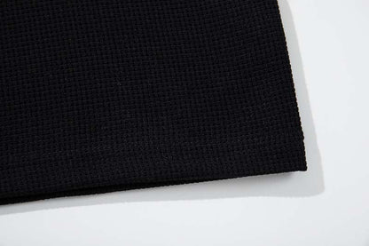 DAXUEN Black short-sleeved waffle knit t-shirt with graphic design