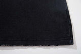 DAXUEN Distressed black graphic t-shirt with raw-edge neckline