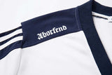 DAXUEN Oversized V-neck T-shirt with contrasting panels and graphics
