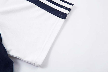 DAXUEN Oversized V-neck T-shirt with contrasting panels and graphics